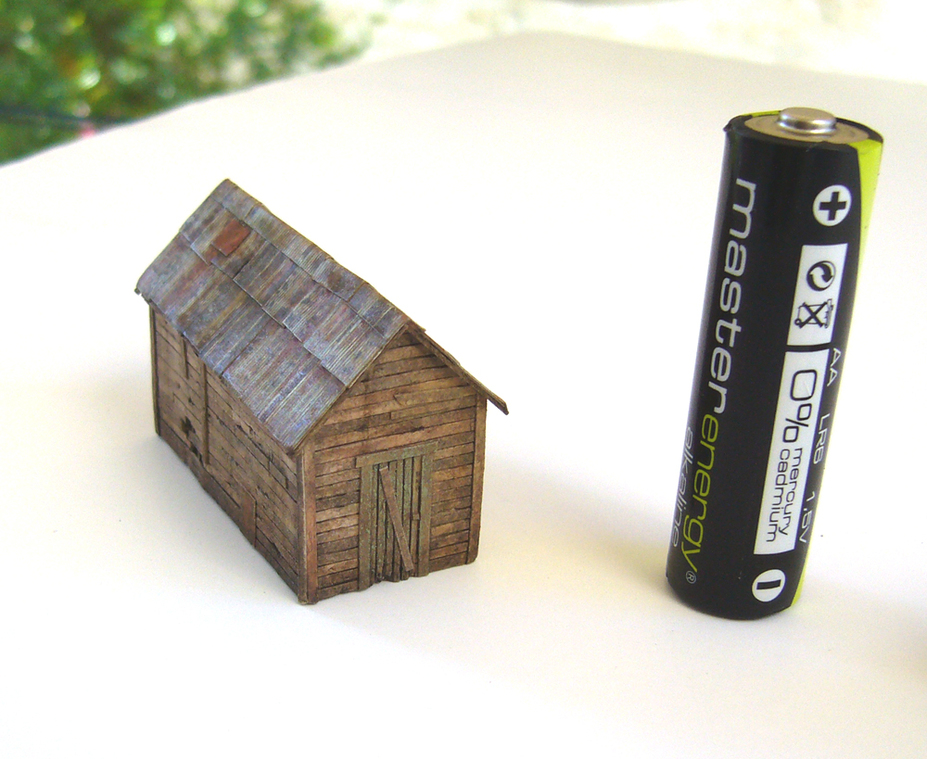 Creating a realistic wooden hut with paper